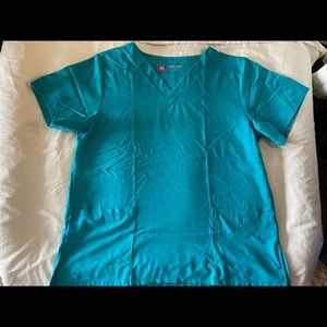 Woman’s Urbane Scrub top- Size L
